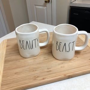 Two Rae Dunn coffee mugs